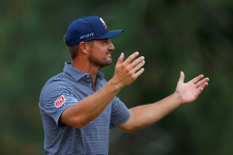 American Bryson DeChambeau, imploring noise from the crowd, carried the US Open lead to the back nine in Sunday's final round at Pinehurst. ©AFP