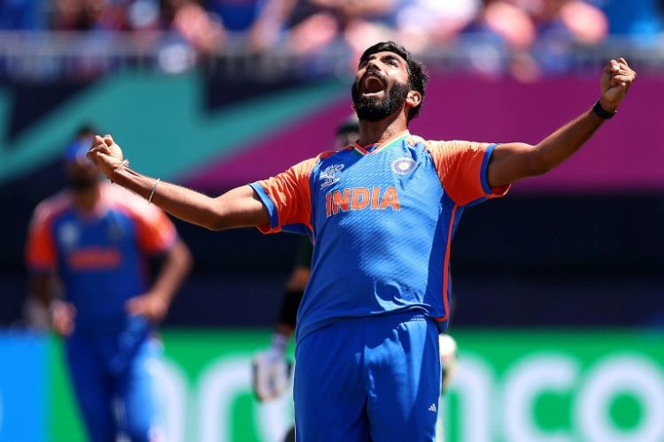 India's Jasprit Bumrah celebrates after dismissing Azam Khan of Pakistan during his team's T20 World Cup victory . ©AFP