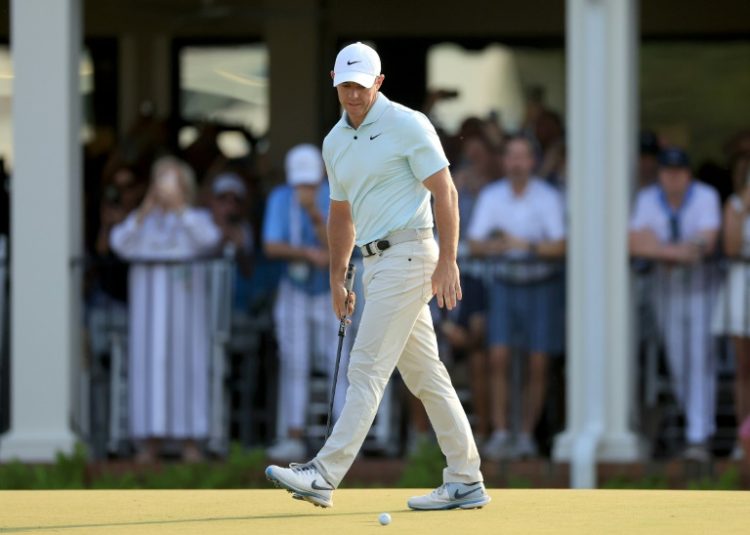 Rory McIlroy reacts to missing a short putt for par on the 18th hole in the final round of the US Open. ©AFP
