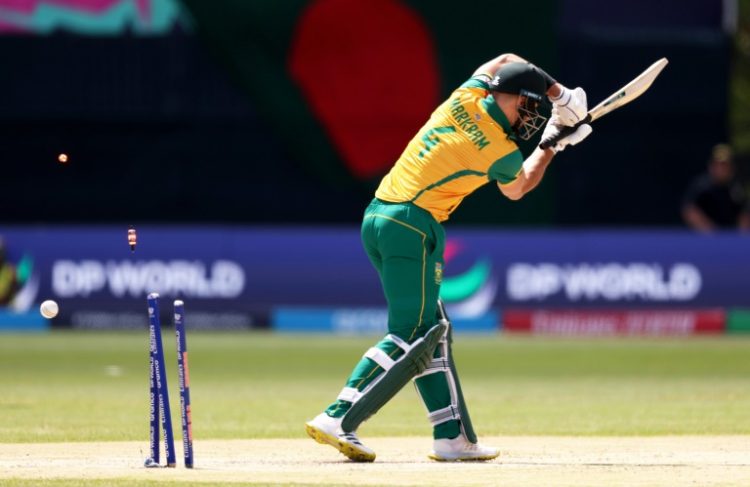 Struggle: South Africa captain Aiden Markram is bowled by Taskin Ahmed of Bangladesh during the group stages. ©AFP