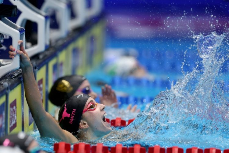 Regan Smith celebrates her world record to win the 100m backstroke at the US Olympic swimming trials. ©AFP