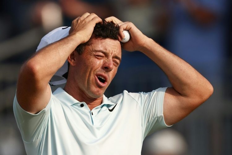 Rory McIlroy reacts after missing a four-foot par putt at the 18th hole in the final round that proved to be his margin of defeat at the US Open at Pinehurst. ©AFP