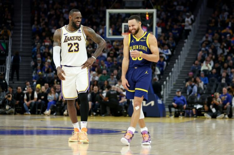 Long-time NBA rivals LeBron James and Stephen Curry will line-up alongside each other for the USA at next month's Olympics. ©AFP
