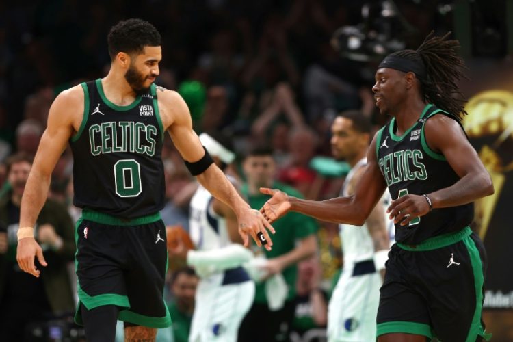 Jayson Tatum and Jrue Holiday of the Boston Celtics high five during the Celtics victory over Dallas in game two of the NBA Finals. ©AFP