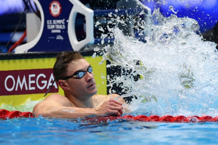 Ryan Murphy smacks the water in satisfaction after winning the 200m backstroke at the US Olympic swimming trials. ©AFP