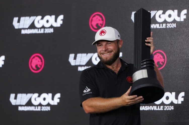 England's Tyrrell Hatton holds the winner's trophy after his first LIV Golf victory came on Sunday at Nashville. ©AFP