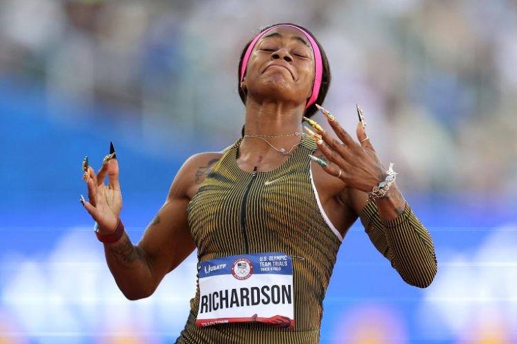 Sha'Carri Richardson reacts after winning the women's 100 meters at the US Olympic athletics trials to secure a berth at the Paris Games. ©AFP
