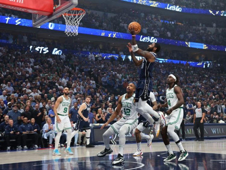 Dallas star Kyrie Irving puts up a shot in the Mavericks' blowout of the Boston Celtics in game four of the NBA Finals. ©AFP