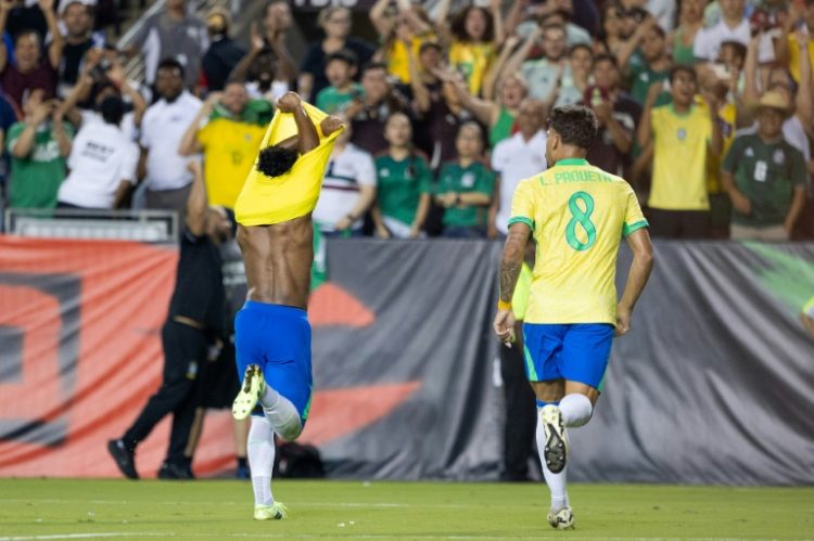 Brazil forward Endrick (left) celebrates his team's winner in a 3-2 victory over Mexico. ©AFP