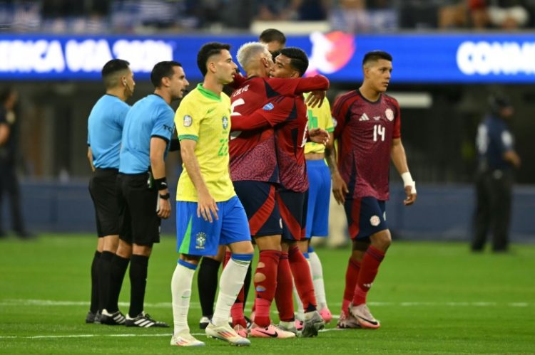 Costa Rican players celebrate after holding Brazil to a 0-0 draw in the Copa America on Monday. ©AFP