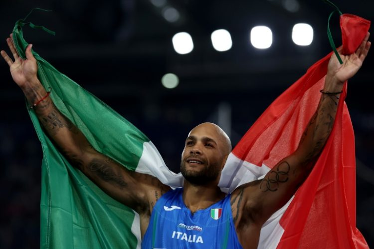 Italy's Marcell Jacobs celebrates after winning gold medal in the men's 100m final at the European Athletics Championships. ©AFP