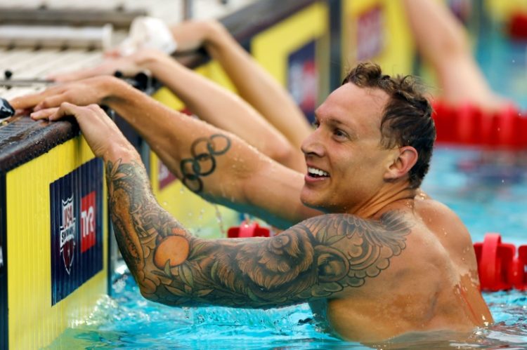 Seven-time Olympic gold medallist Caeleb Dressel will aim to secure a Paris Games berth at the US Olympic swimming trials. ©AFP