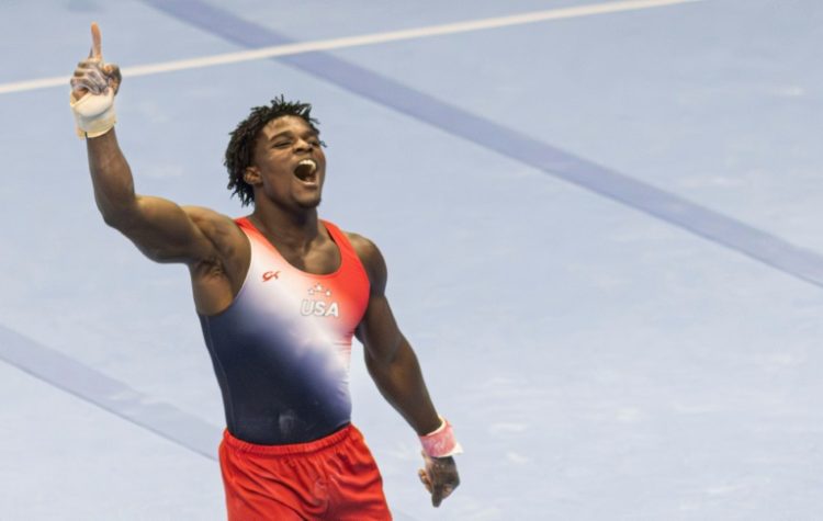 Fred Richard reacts after his floor exercise at the US Olympic gymnastics trials. ©AFP