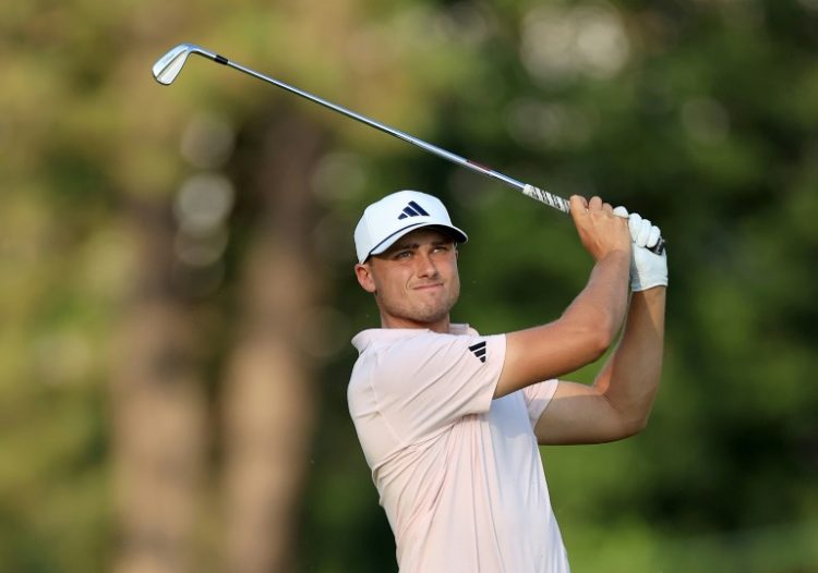 Sweden's Ludvig Aberg fired a one-under par 69 to grab a one-stroke lead after Friday's second round of the US Open at punishing Pinehurst. ©AFP