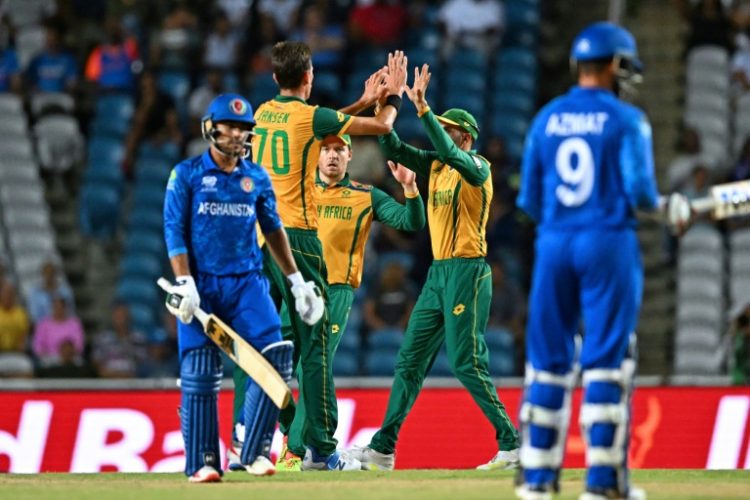 South Africa's Marco Jansen (left) celebrates after having Afghanistan's Nangeyalia Kharote out caught behind in their World Cup semi-final. ©AFP
