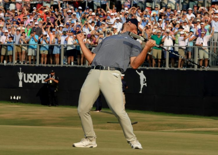 Bryson DeChambeau celebrates his winning putt on the 18th green in th final round of the US Open at Pinehurst. ©AFP