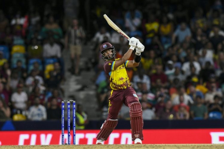 Shai Hope smashes a six en route to 82 from 39 balls in West Indies'  nine-wicket drubbing of the USA in the T20 World Cup. ©AFP