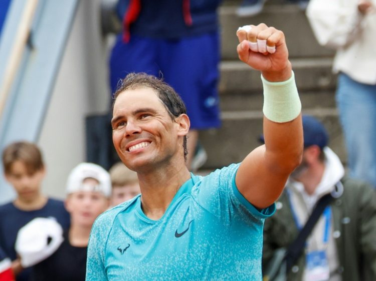 Spain's Rafael Nadal, celebrating a victory in his first match since May 27, was among those who received main draw entries for this year's US Open. ©AFP