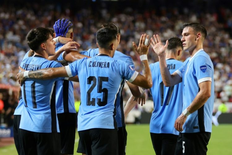 Uruguay's Mathias Olivera celebrates after scoring the goal which helped eliminate the United States from the Copa America . ©AFP