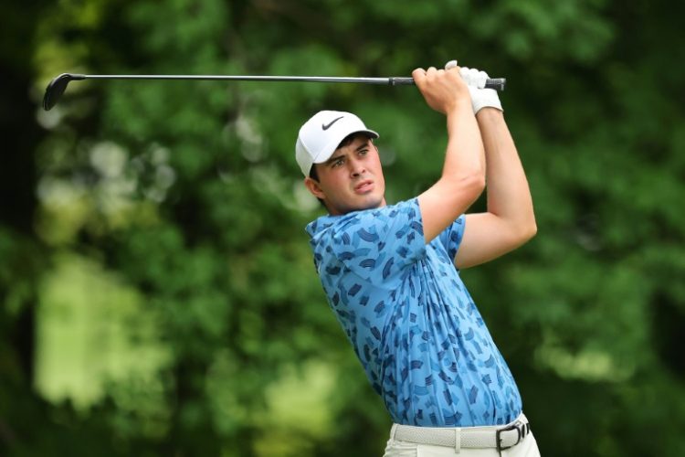 American Davis Thompson fired a seven-under par 64 to win the John Deere Classic for his first PGA Tour title. ©AFP