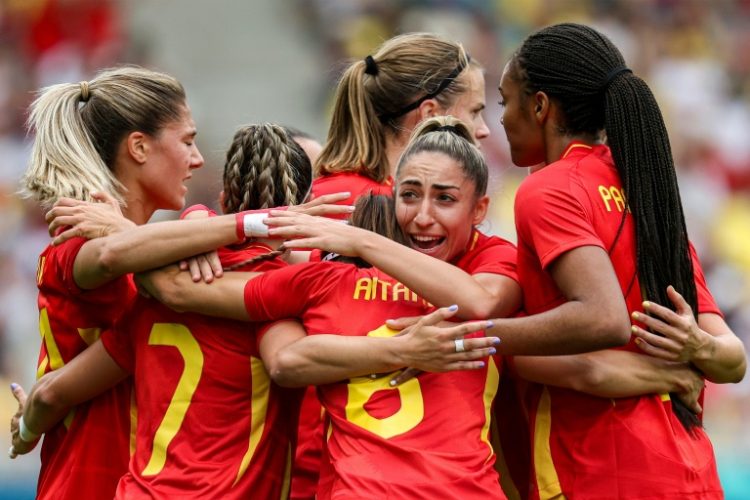 Spain players celebrate after scoring during their 2-1 win over Japan in Nantes on Thursday. ©AFP