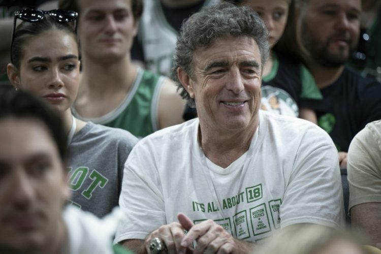 Boston Celtics owner Wyc Grousbeck, enjoying a victory celebration last month after the team won the NBA title, announced the team ownership group intends to sell all shares of the club. ©AFP