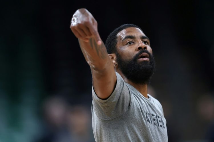 The Dallas Mavericks say star guard Kyrie Irving is recovering from surgery to repair a broken left hand. ©AFP