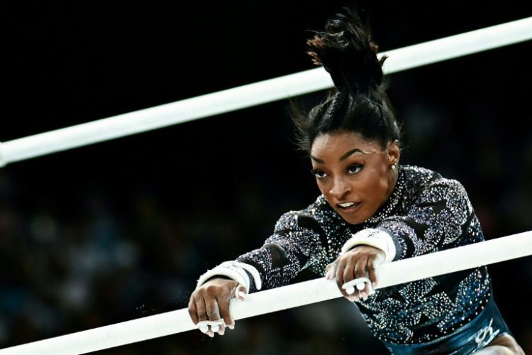 Simone Biles competes in the gymnastics qualifying competition at the Paris 2024 Olympics. ©AFP