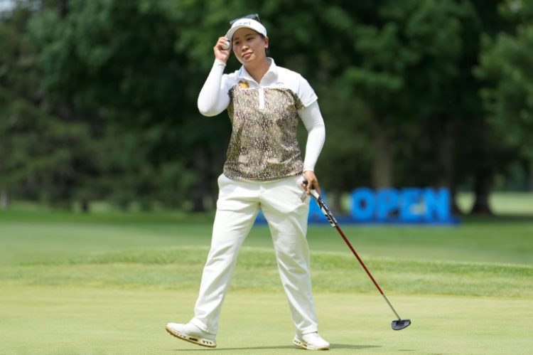 Thailand's Chanettee Wannasaen tips her cap to the crowd on her way to victory in the LPGA Dana Open. ©AFP