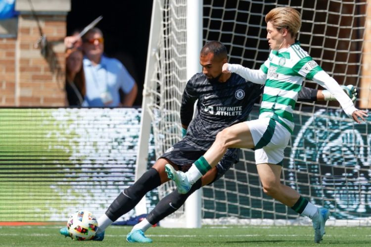 Celtic's Japanese forward Kyogo Furuhashi, right, pressures Chelsea's Spanish goalkeeper Robert Sanchez during a pre-season club friendly football match won 4-1 by Celtic at South Bend, Indiana. ©AFP