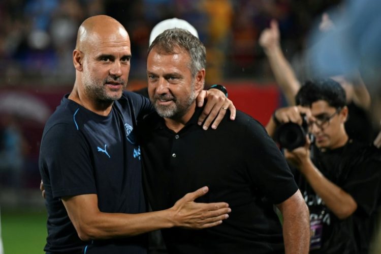 Barcelona manager Hansi Flick, right, was facing off against former Barca player and manager Pep Guardiola . ©AFP