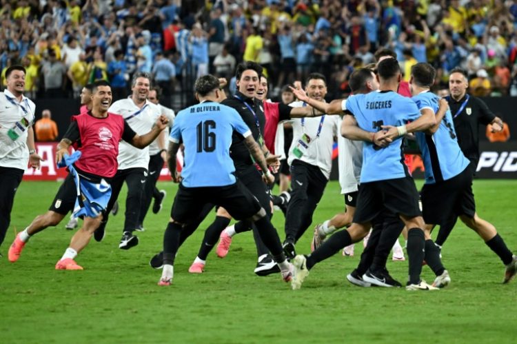 Uruguay celebrated a penalty shoot out victory over Brazil in their Copa America quarter-final on Saturday.. ©AFP