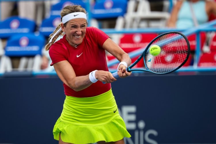 Victoria Azarenka returns a shot during her victory over American Hailey Baptiste at the WTA Washington Open. ©AFP