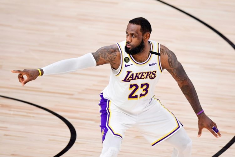 LeBron James scored the winning layup with eight seconds remaining to give the United States a 101-100 victory over South Sudan in a pre-Olympic exhibition game at London, avoiding an epic upset loss by the American squad of NBA stars. ©AFP