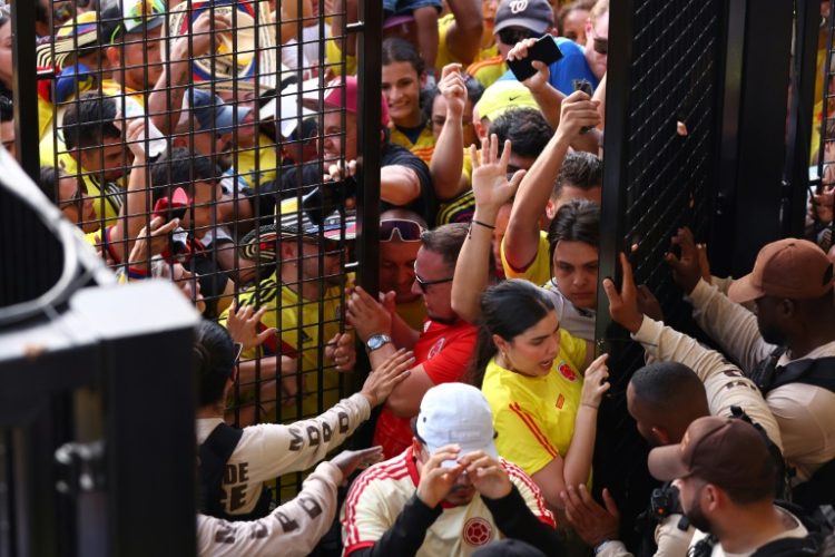 Fans are caught in a crush during chaotic scenes before the Copa America final on Sunday which have raised concerns over planning for the 2026 World Cup in North America. ©AFP