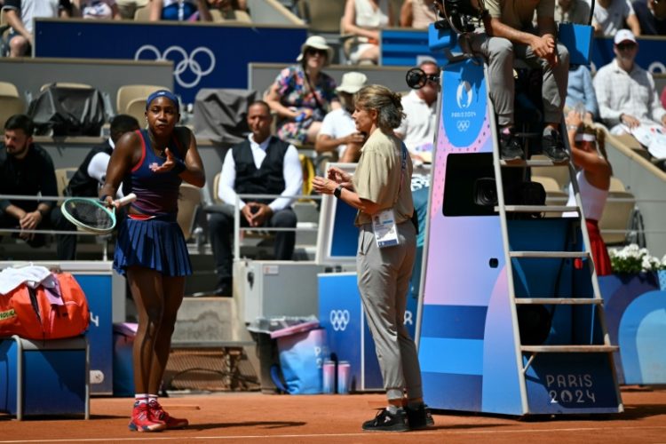 Flashpoint: Coco Gauff speaks with an official after the call goes against her while playing Croatia's Donna Vekic. ©AFP