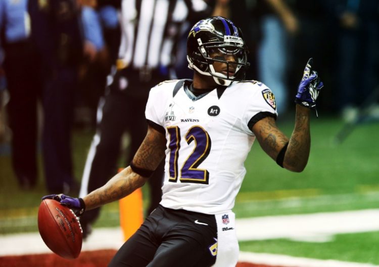 Jacoby Jones reacts after scoring on a 108-yard kick-off return for the Baltimore Ravens in their Super Bowl win over San Francisco in February 2013. ©AFP