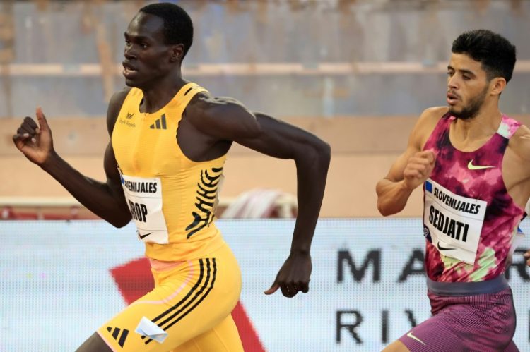 Algeria's Djamel Sedjati (R) and Canada's Marco Arop (L) compete in the men's 800m. ©AFP