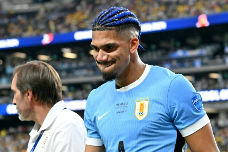 Uruguay's defender Ronald Araujo was substituted with an injury in Saturday's win over Brazil and will miss the semi-final clash with Colombia.. ©AFP