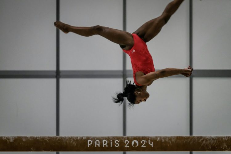 Simone Biles takes part in a training session in Paris ahead of the Olympics. ©AFP