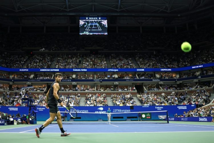 Centre of attention: Carlos Alcaraz eyes the ball as he plays against Botic van de Zandschulp. ©AFP