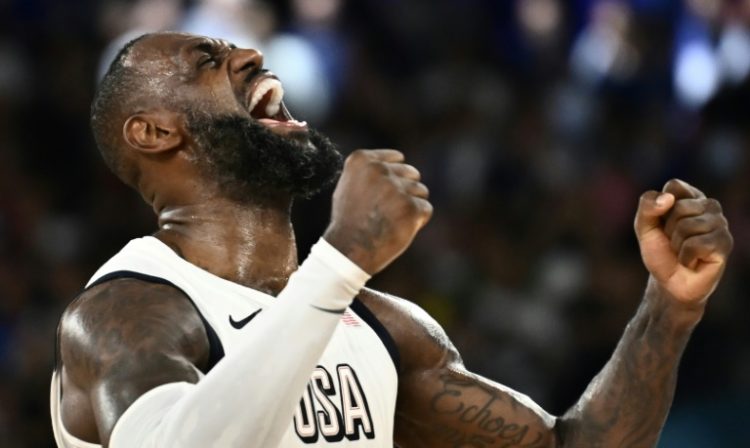 LeBron James roars with delight after the US chased down Serbia to reach the Olympic men's basketball final. ©AFP