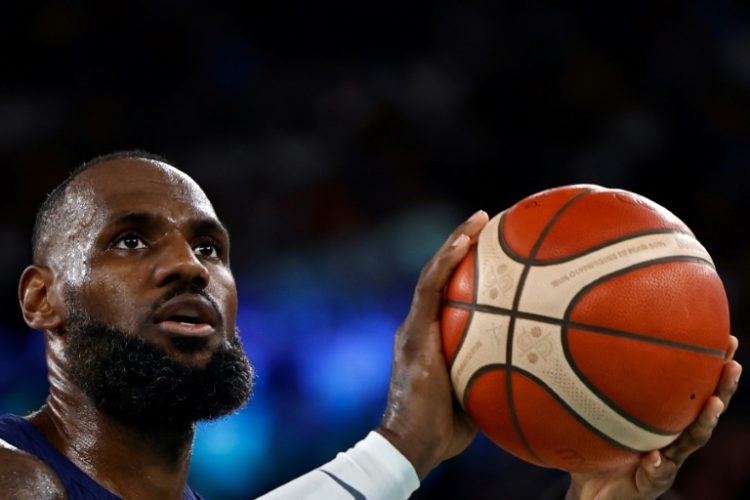 LeBron James takes a free throw in the United States' quarter-final victory over Brazil in the Olympic men's basketball tournament. ©AFP