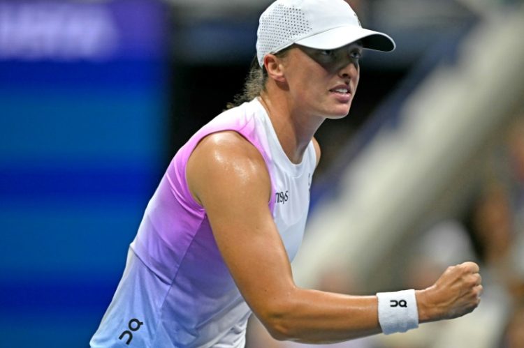 Top seed Iga Swiatek celebrates a point on the way to a US Open third-round victory over Anastasia Pavlyuchenkova. ©AFP