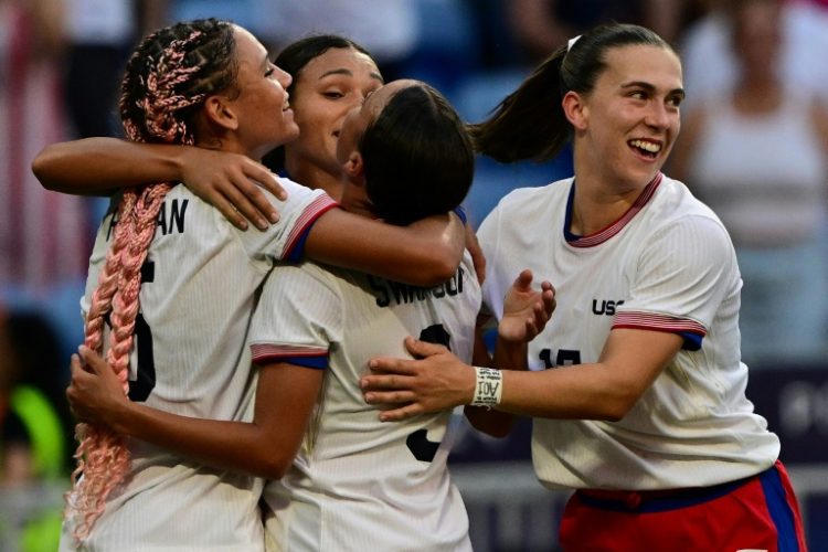 United States players celebrate after Sophia Smith struck the crucial goal in their Olympic women's football semi-final against Germany. ©AFP