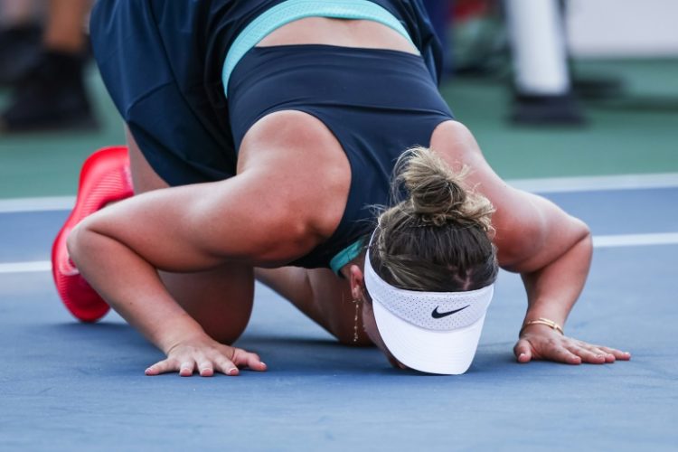 Spain's Paula Badosa kisses the court after winning the final of the WTA Washington Open. ©AFP