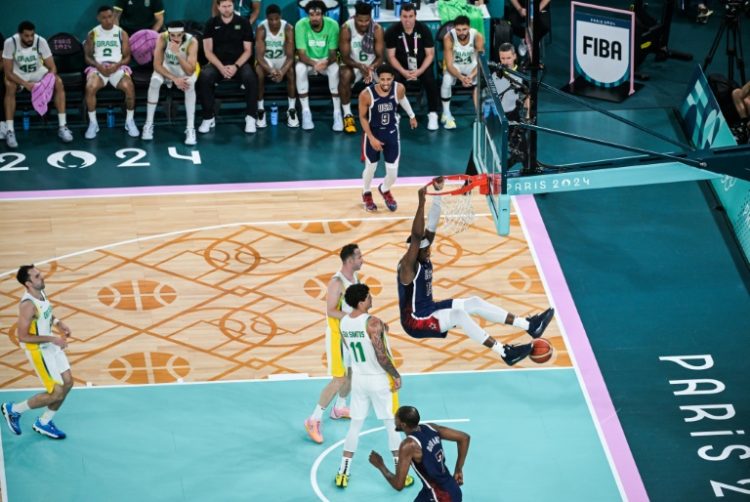 Bam Adebayo throws down a dunk in the US victory over Brazil in the men's Olympic basketball quarter-finals. ©AFP