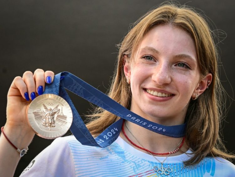 Romanian gymnast Ana Barbosu describes herself as 'happy and grateful' after getting Olympic bronze. ©AFP