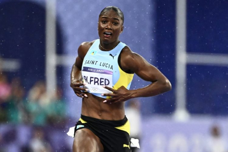 Julien Alfred pulled off a surprise by winning the women's Olympic 100m final for St Lucia. ©AFP