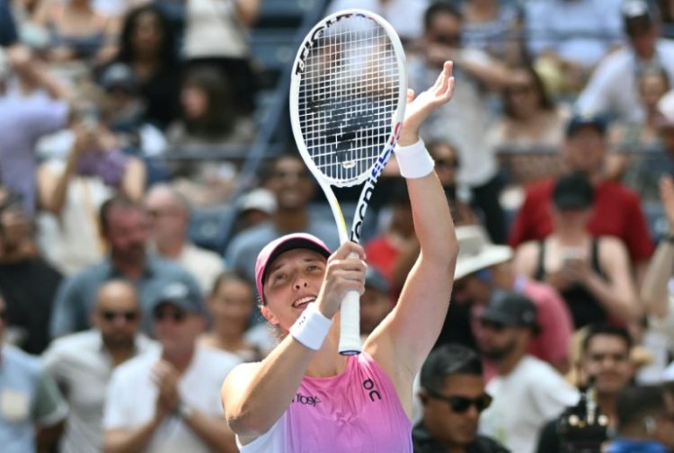 Winning moment: Iga Swiatek celebrates defeating Kamilla Rakhimova. ©AFP